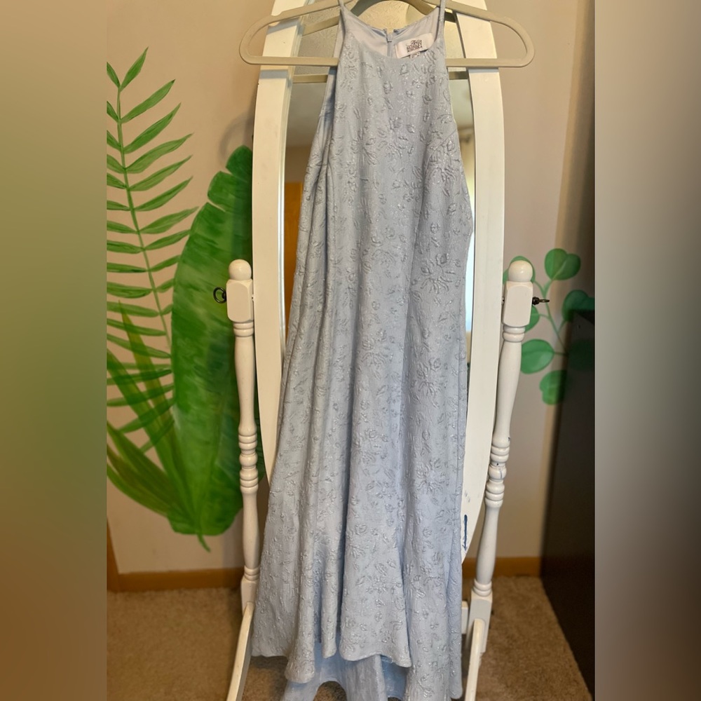 MIDI length, cascading hemline, light blue color